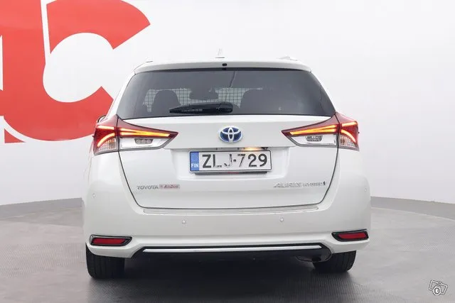 Toyota Auris Touring Sports 1,8 Hybrid Premium - PUOLINAHAT / 1-OMISTAJA / LOHKOLÄM. / NAVI / HUIPPUVARUSTELTU PREMIUM MALLI / UUDET KESÄRENKAAT Image 4